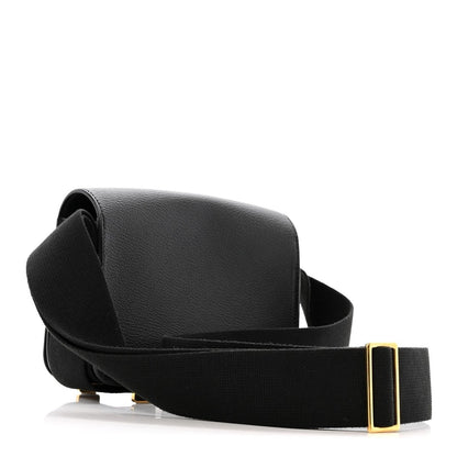 Black leather crossbody bag with wide strap and gold-tone hardware