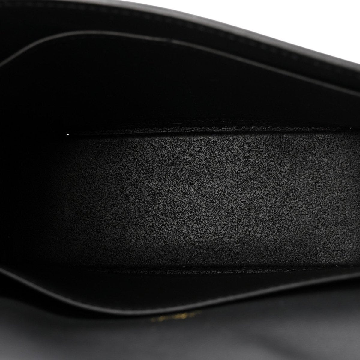 Black leather crossbody bag interior close-up