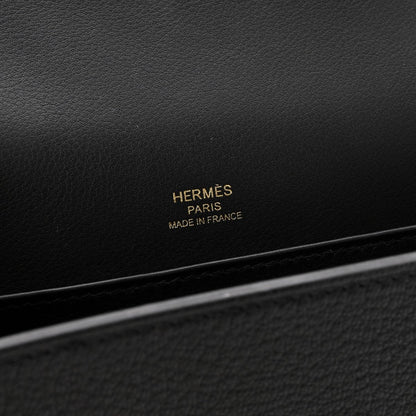 Black leather crossbody bag with HERMÈS Paris Made in France stamp