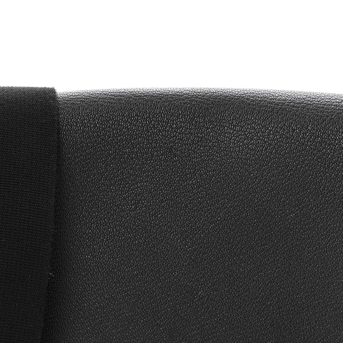 Black leather crossbody bag textured side panel closeup
