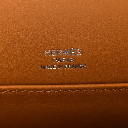 Caramel leather bag panel with “HERMES PARIS MADE IN FRANCE” stamp