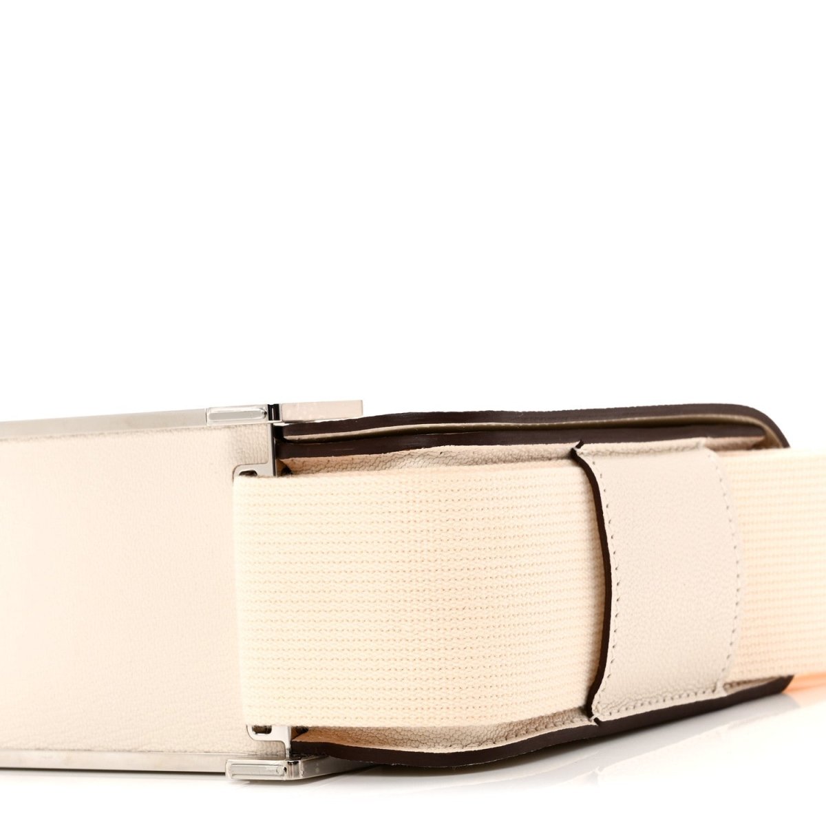 Hermes Nata messenger bag side view with metal clasp and textured strap