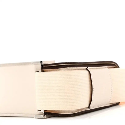 Hermes Nata messenger bag side view with metal clasp and textured strap