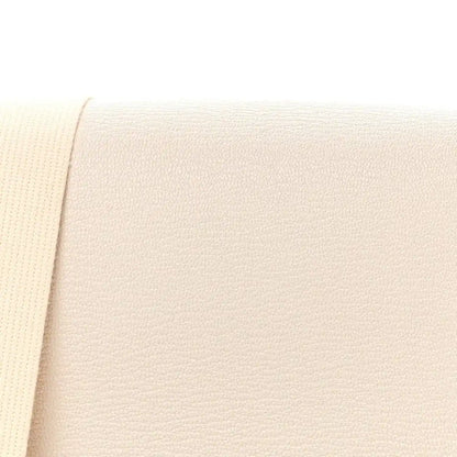 Nata textured goatskin flap panel of Hermes messenger bag