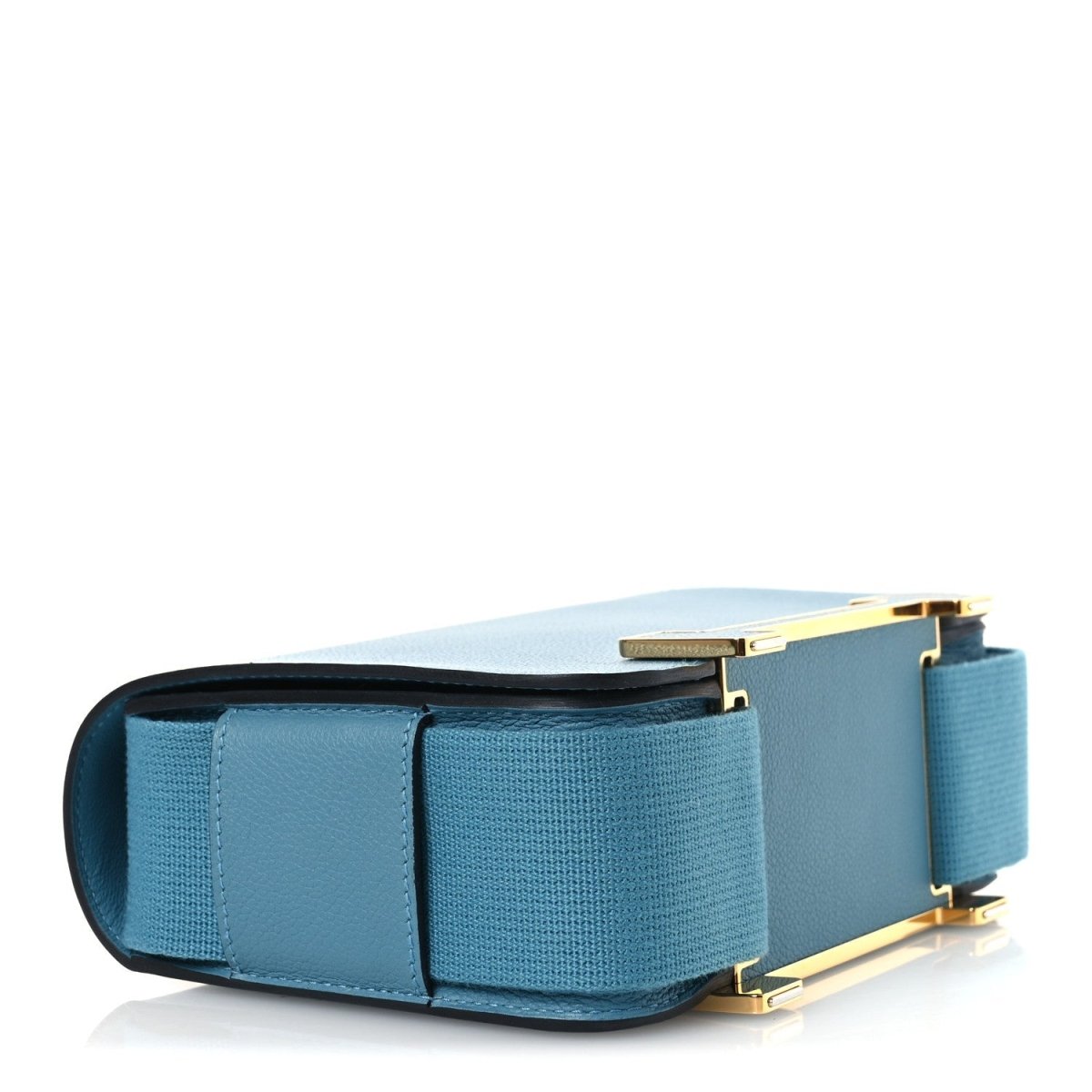 Light blue leather messenger bag with top flap and gold-tone clasp hardware.