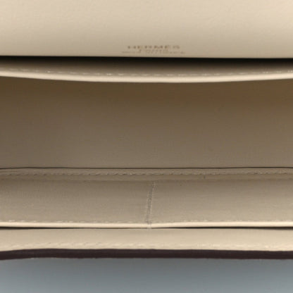 Light leather crossbody lining seam and stitching detail
