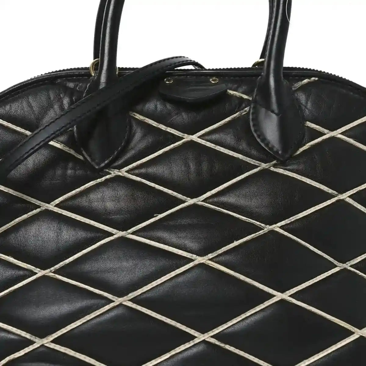 Black quilted lattice lambskin handbag with curved top handles