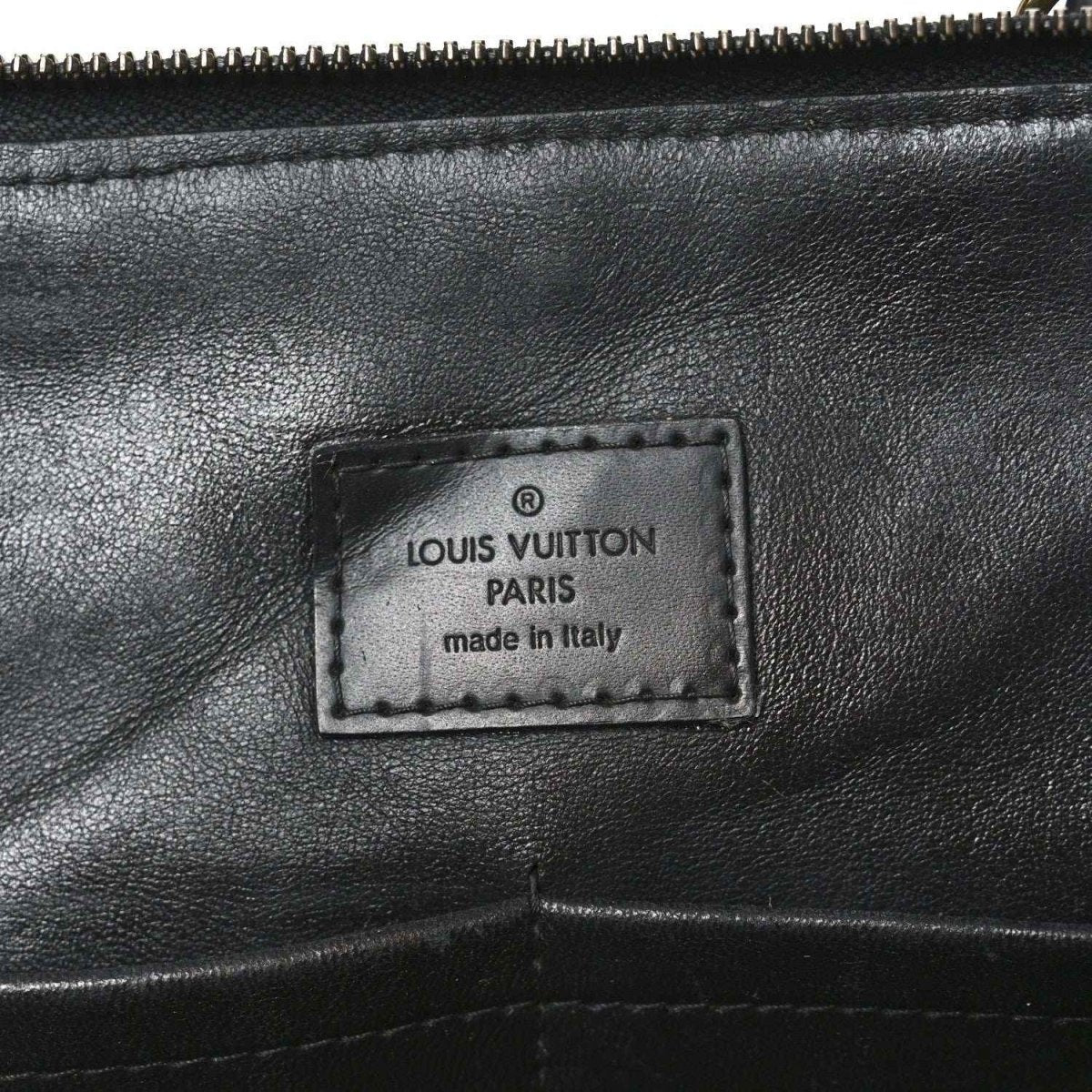 Louis Vuitton Paris label on black leather interior