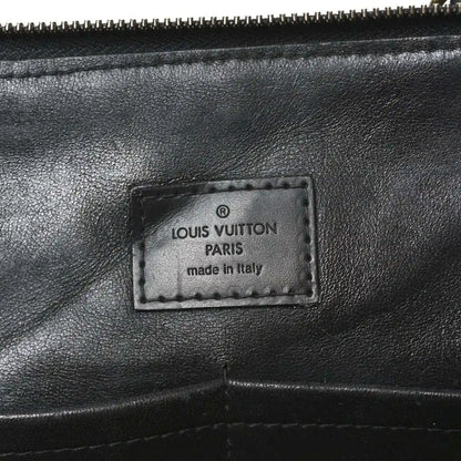 Louis Vuitton Paris label on black leather interior