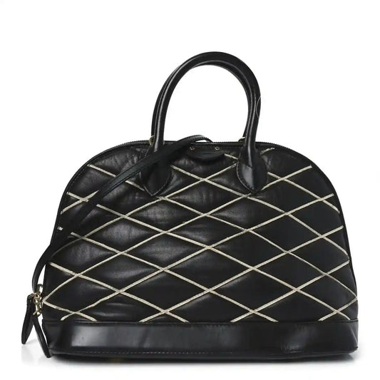 Black quilted lambskin Alma PM handbag with top handles and gold-tone hardware