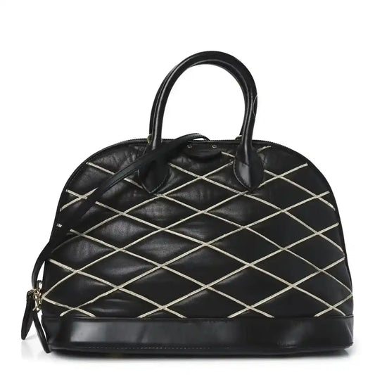 Black quilted lambskin Alma PM handbag with top handles and gold-tone hardware