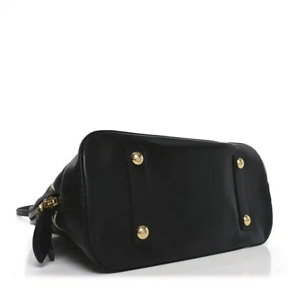 Black leather handbag, front panel with gold-tone stud accents and zipper