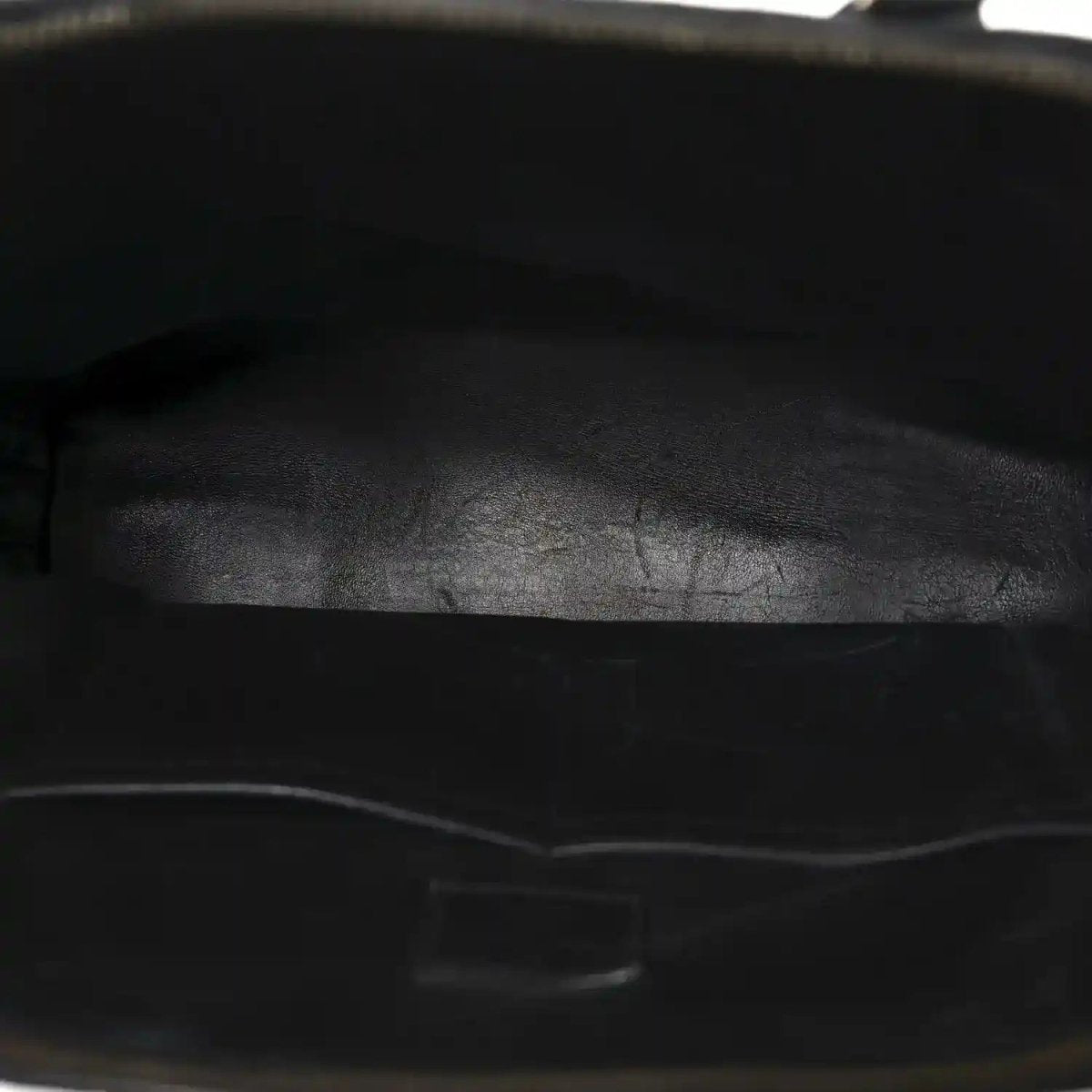Black leather interior lining with zipper track edge