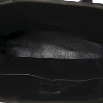 Black leather interior lining with zipper track edge