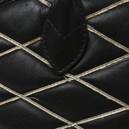 Black quilted lambskin lattice with white leather trim stitching