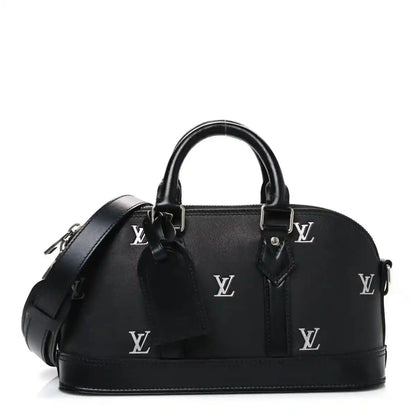 Black Louis Vuitton monogram Alma handbag with top handles and shoulder strap