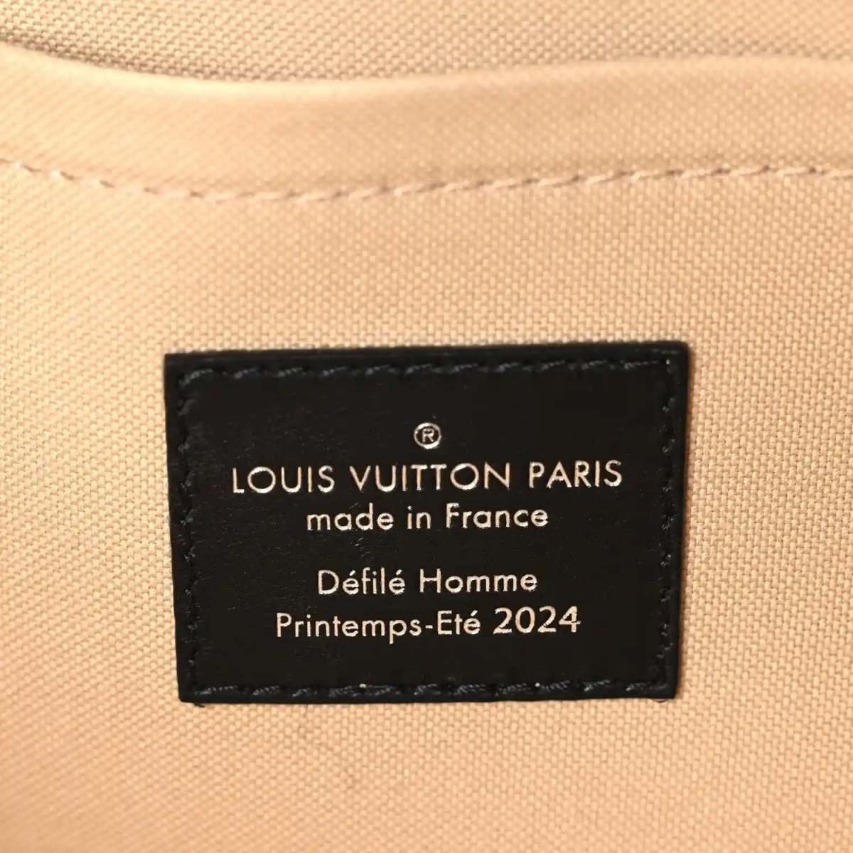 Alma handbag beige lining with Louis Vuitton Paris label and made in France text