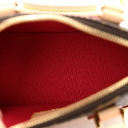 Mini handbag interior lining with red fabric and tan leather edge