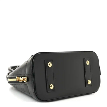 Louis Vuitton Alma BB handbag, black embossed calfskin with gold hardware accents
