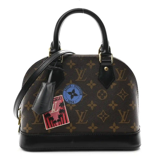 Small monogram tote with dark brown canvas, black top handles, and gold hardware