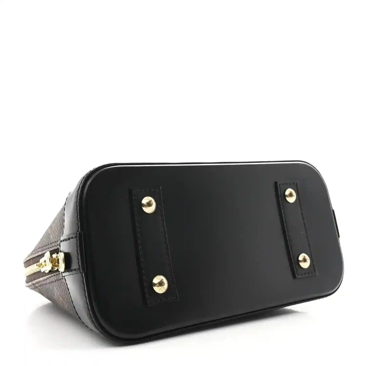Small monogram tote with black front panel, gold studs, and black leather trim