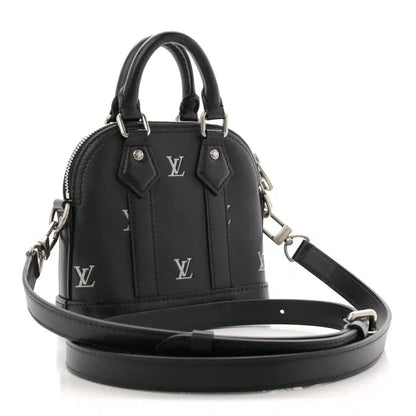 Louis Vuitton Nano Alma mini tote in black calfskin with crossbody strap and silver-tone details