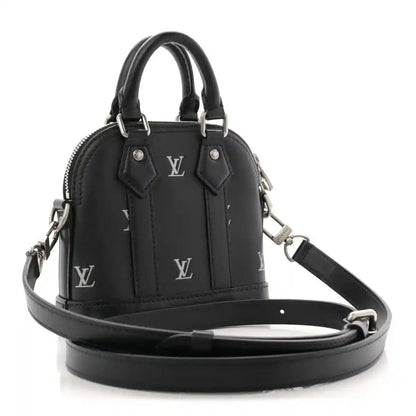 Louis Vuitton Nano Alma mini tote in black calfskin with crossbody strap and silver-tone details