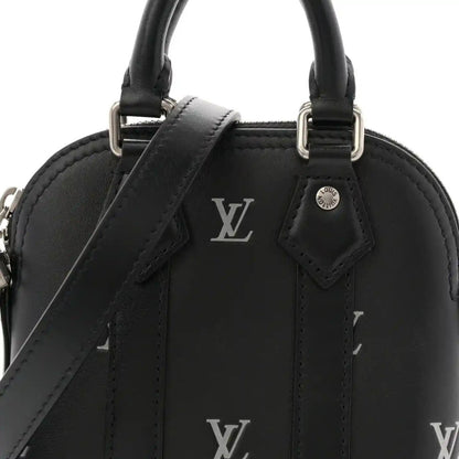 Louis Vuitton Nano Alma mini tote front close-up in black calfskin with LV emblem