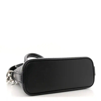 Louis Vuitton Nano Alma mini tote black calfskin front with rounded shape and zip exterior