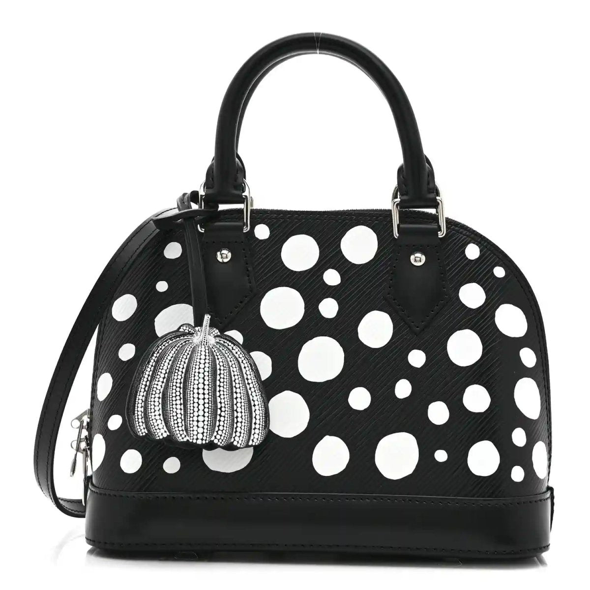 Alma BB bag with black leather look, white polka dots, top handles, pumpkin charm