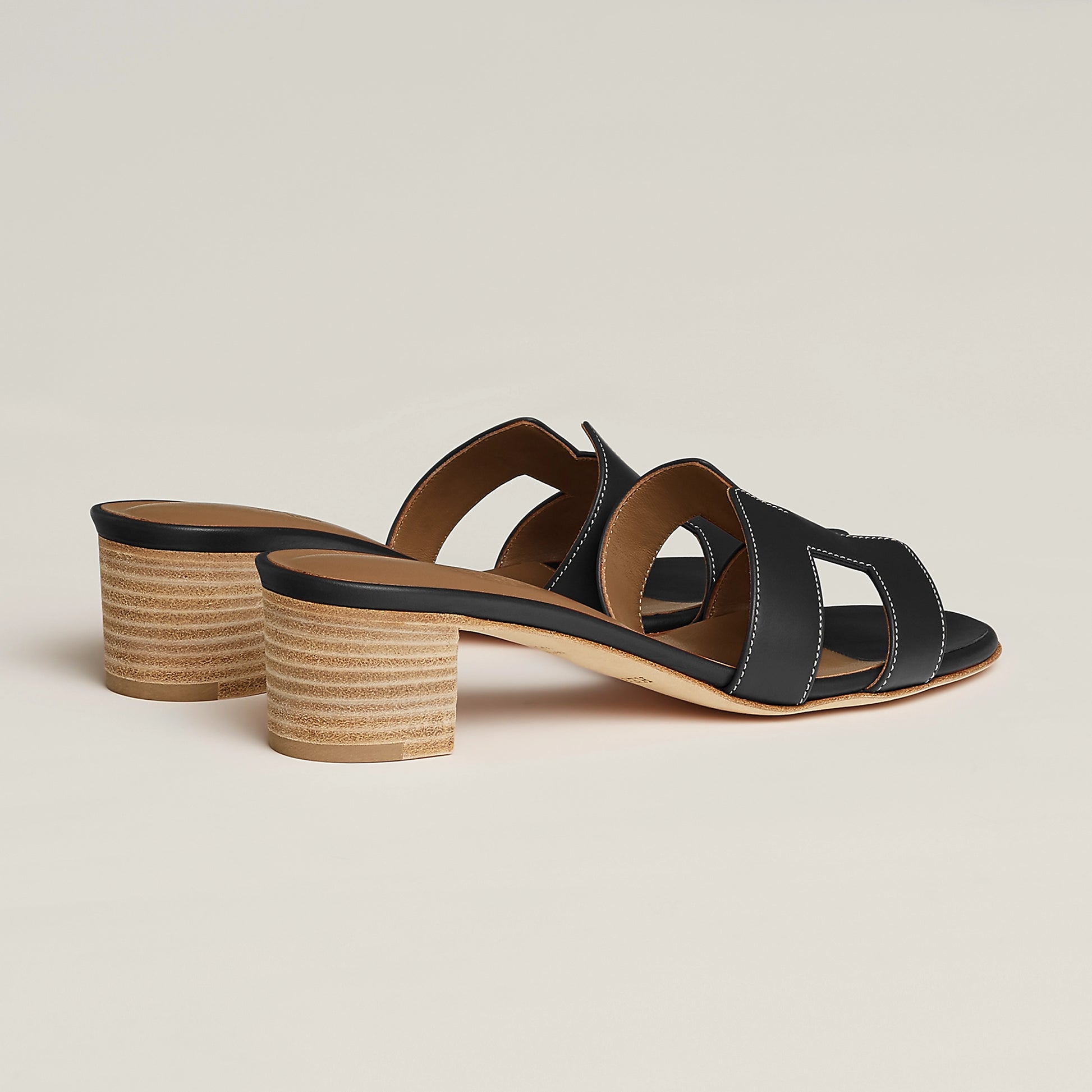 Hermès Oasis sandal in dark leather, open-toe slide with block heel and cutout straps