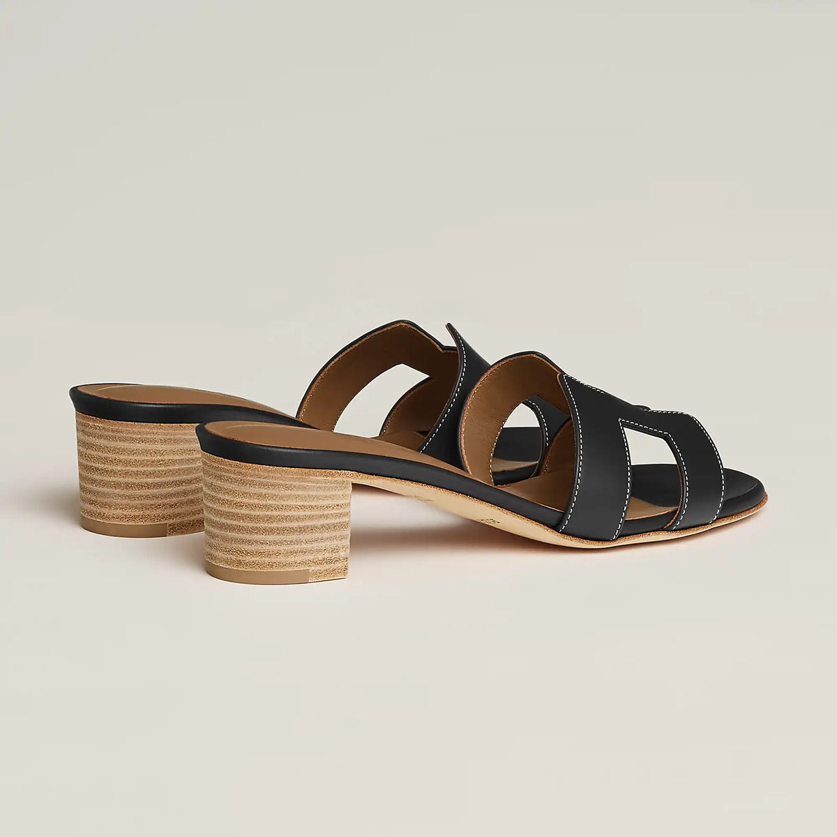Hermès Oasis sandal in dark leather, open-toe slide with block heel and cutout straps