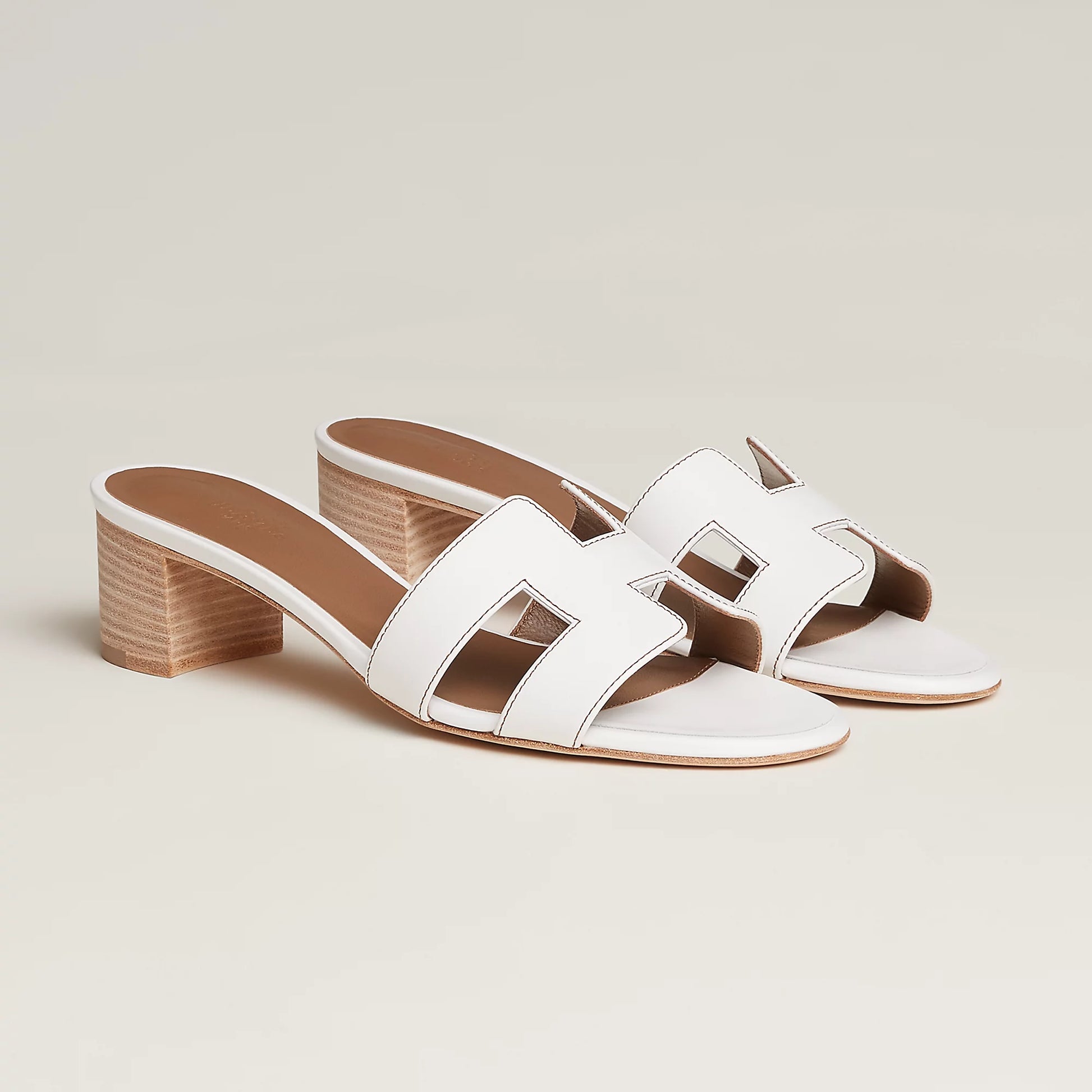 Hermès Oasis sandal in white leather, open-toe slide with block heel and H-shaped straps