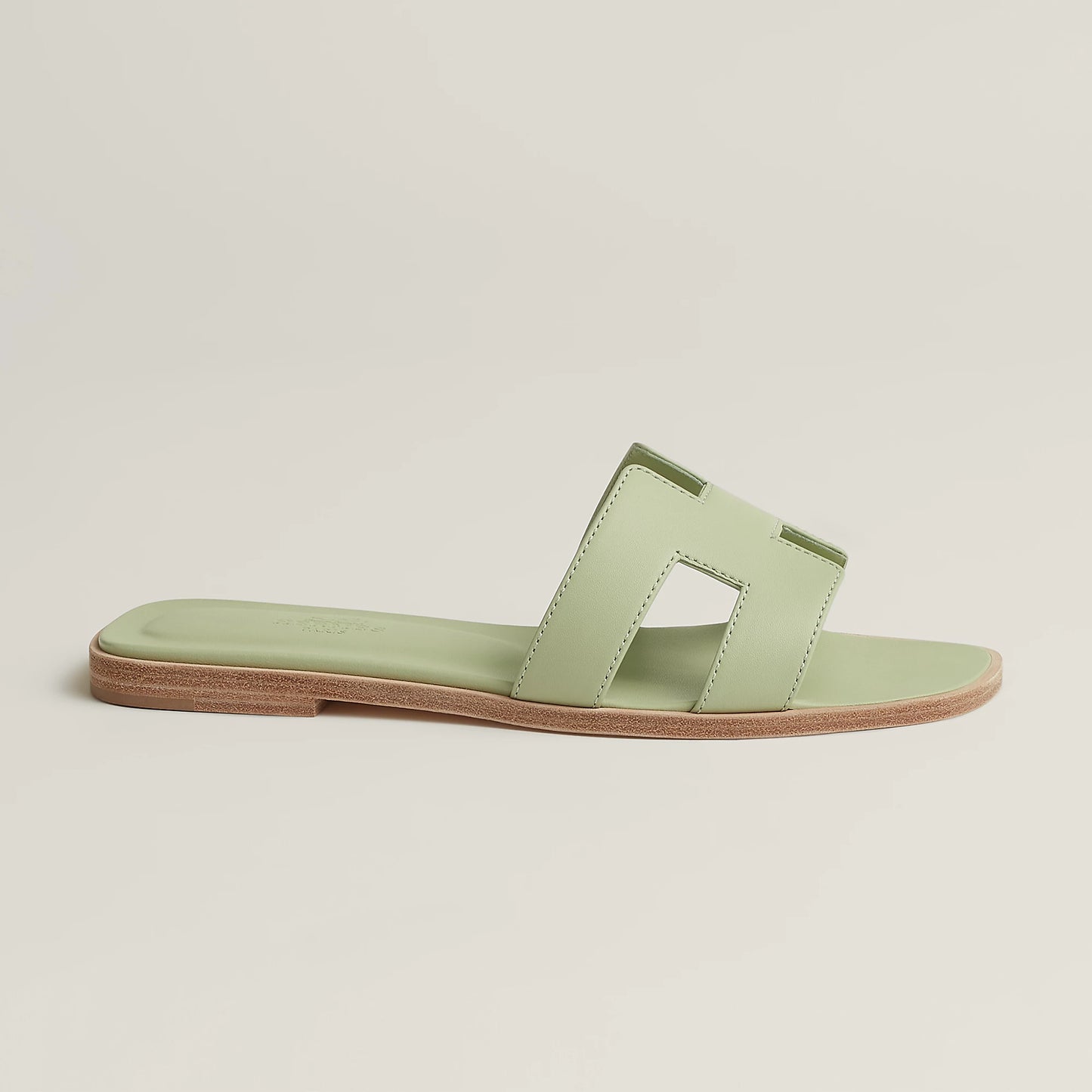 Hermès Oran slide sandal in pale mint leather with cutout double straps