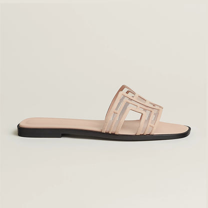 Hermès Oran sandal in nude calfskin leather with black sole