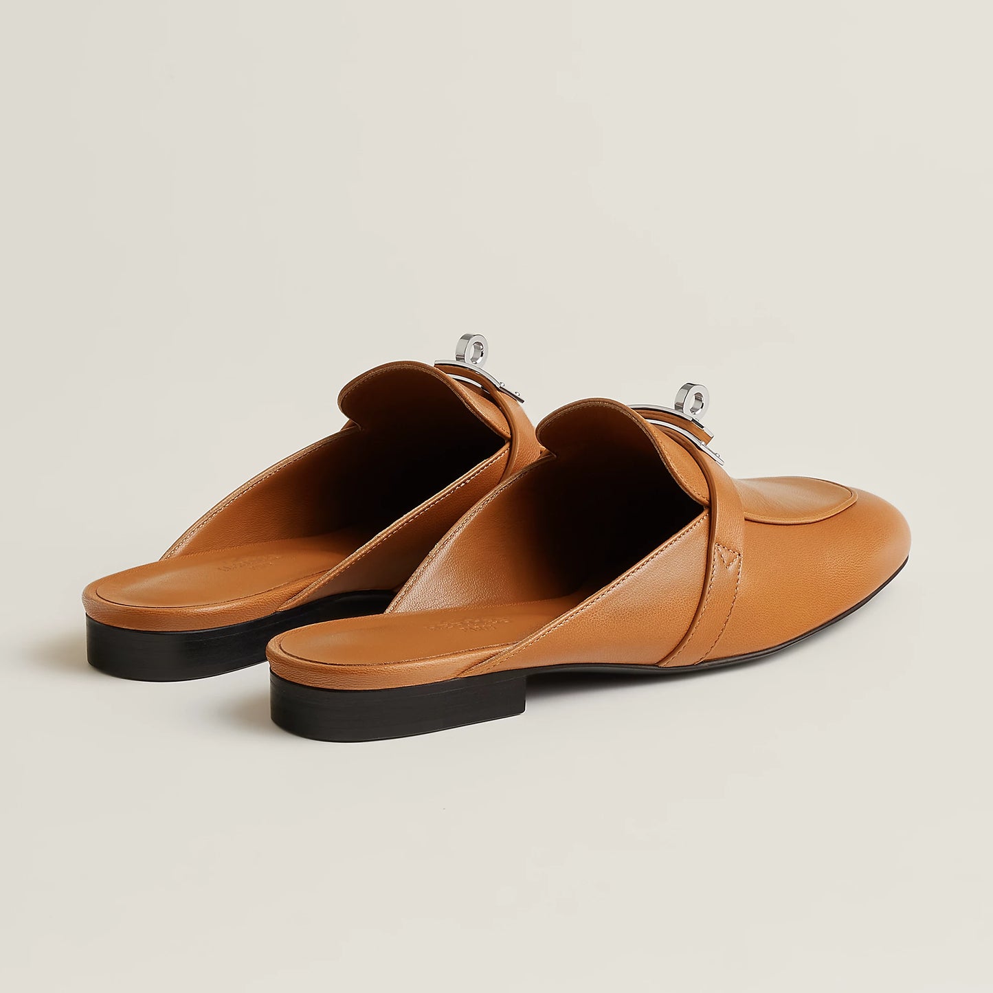 Hermès Oz goatskin mule, tan leather with silver-tone buckle, open slide back