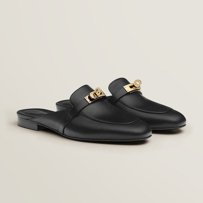 Hermès Oz goatskin mule, black leather with gold-tone buckle and low heel