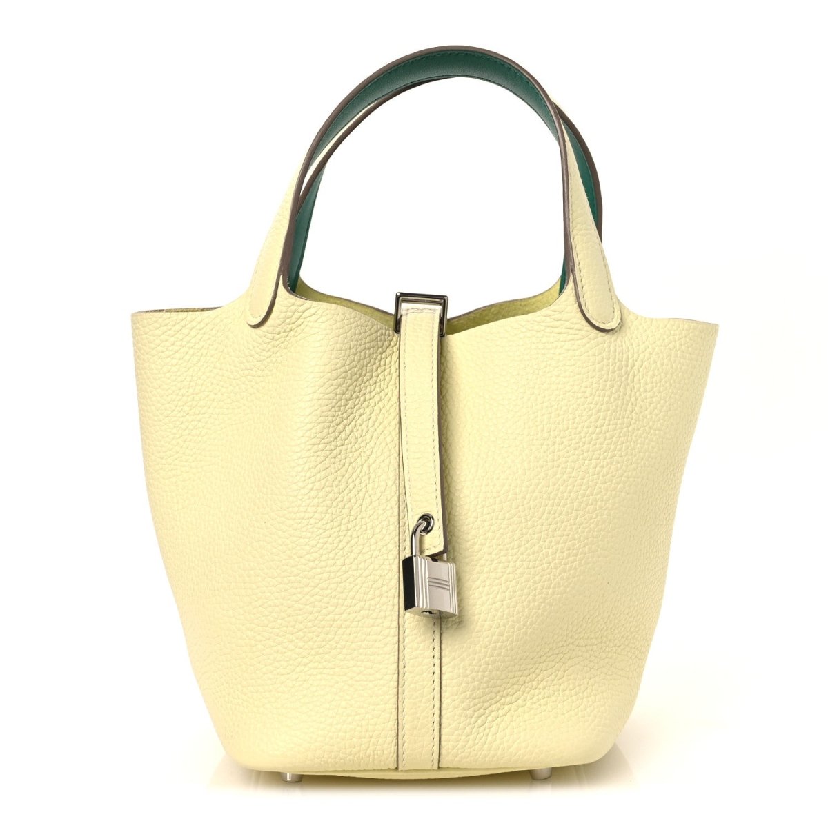 Two-tone leather handbag with yellow body, green top handles, and metal lock clasp.