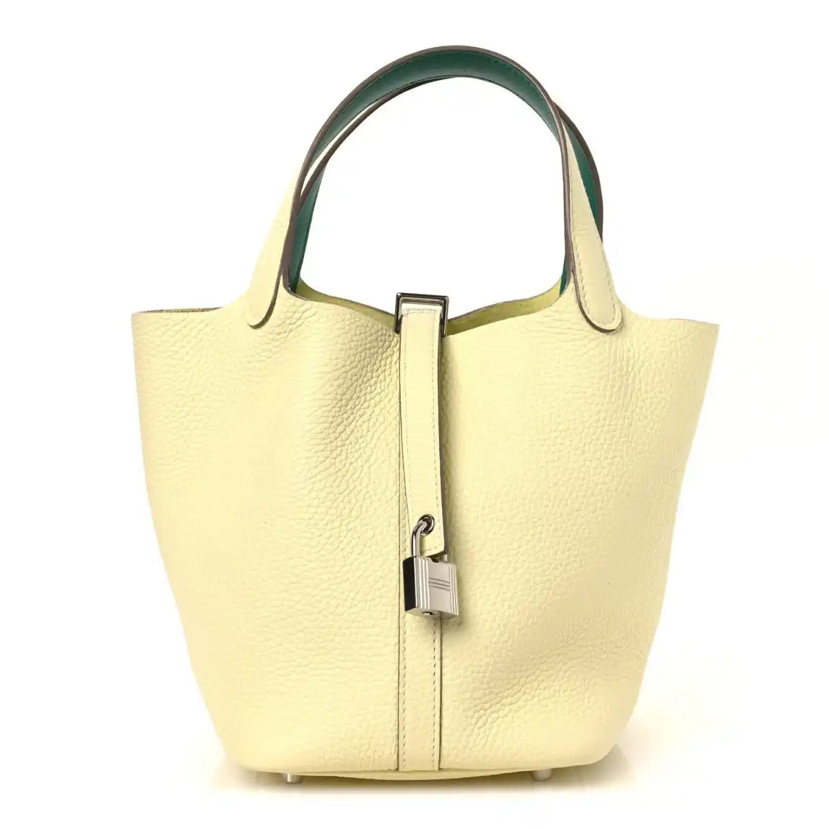Two-tone leather handbag with yellow body, green top handles, and metal lock clasp.