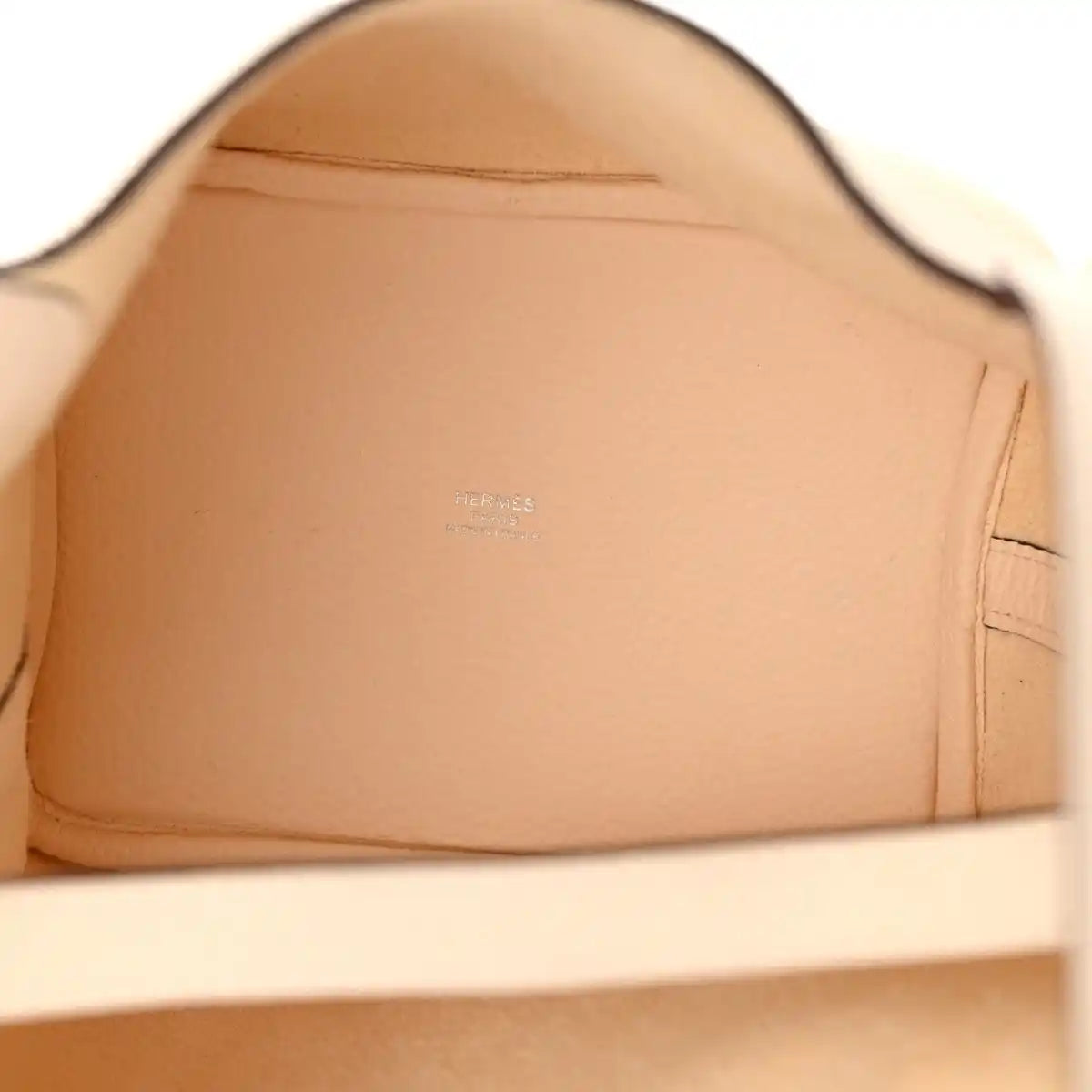 Nata leather handbag interior with stamped logo and stitched seams