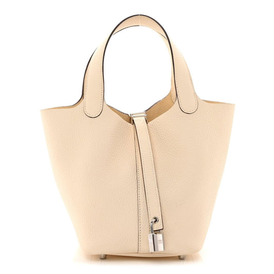 Nata leather tote handbag with top handles and lock closure