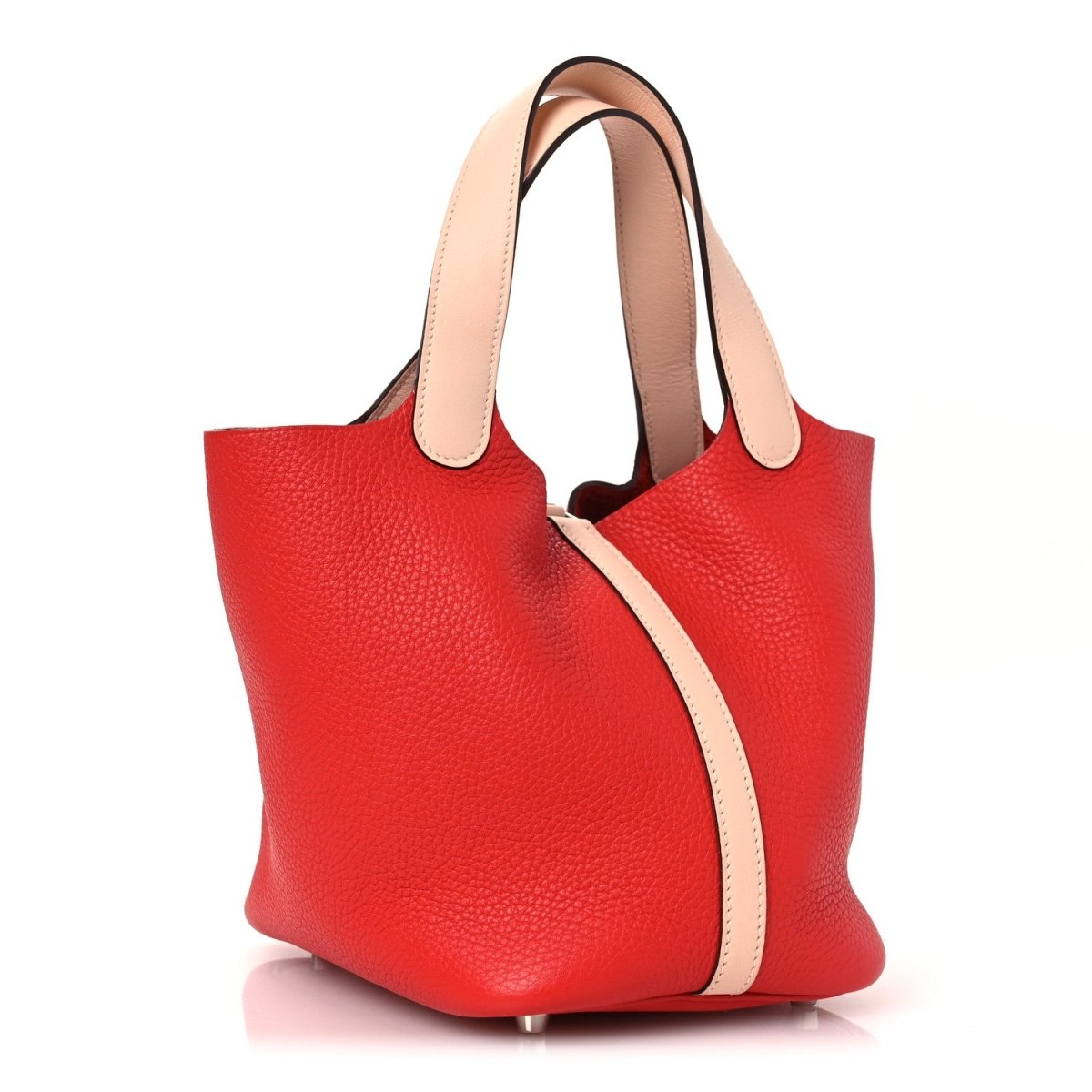 Red pebbled leather tote bag with pale shoulder strap and front lock clasp.