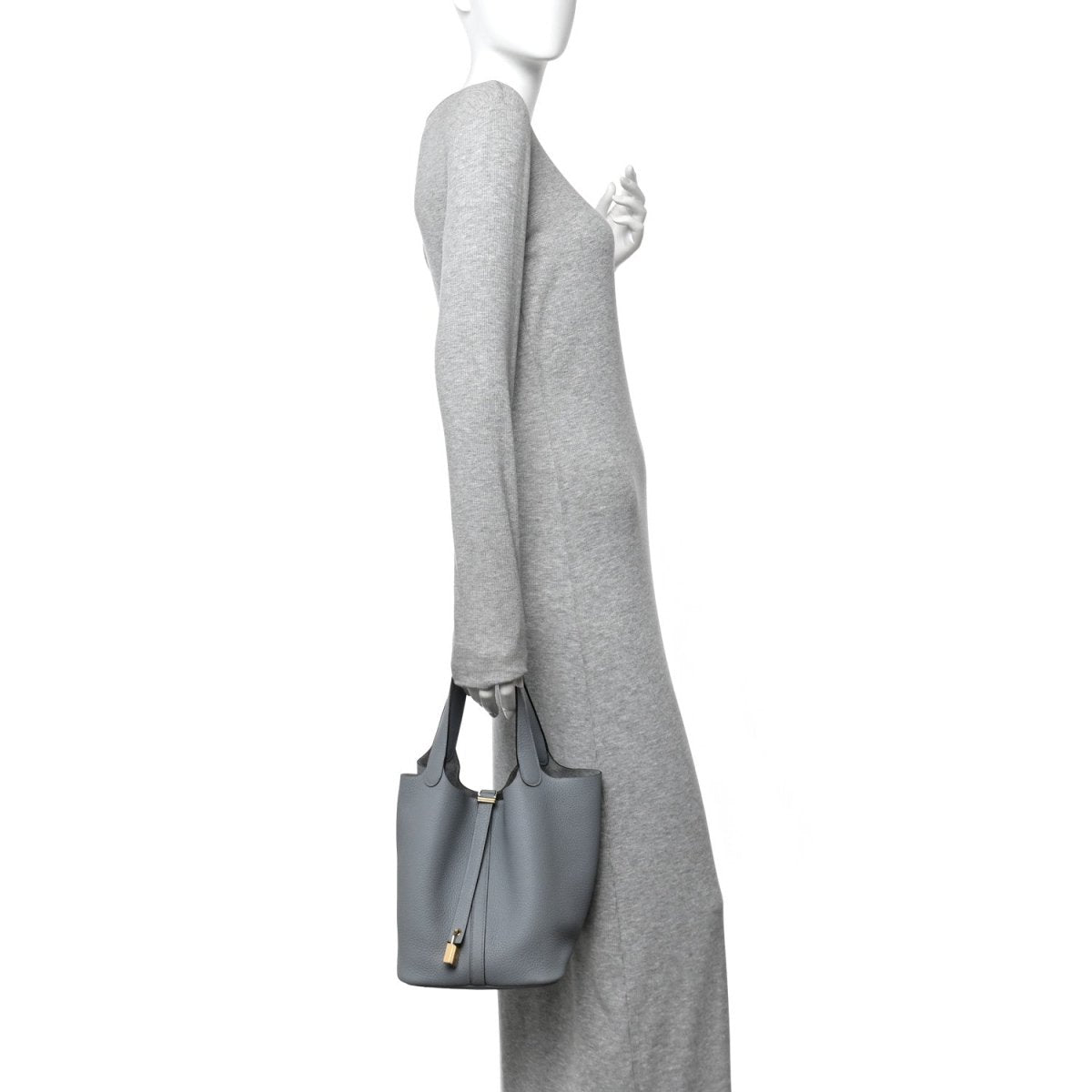 Small gris leather tote bag with short handles and lock clasp, side view