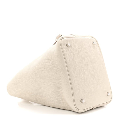 Off-white leather bucket bag with top handle and front lock strap detail