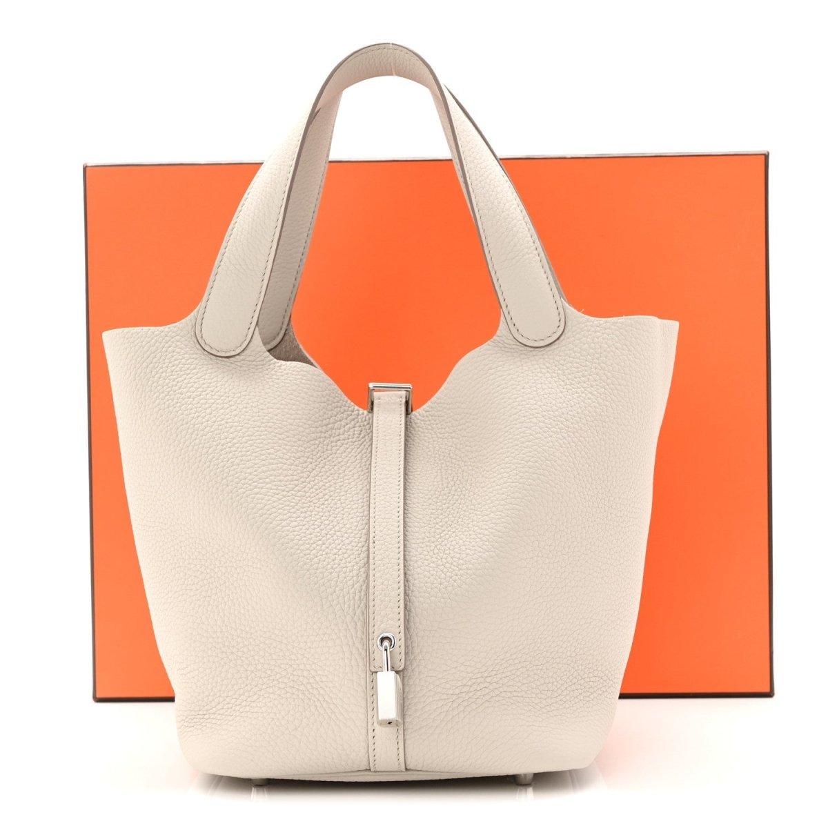 Light beige leather bucket bag with two top handles and center lock closure