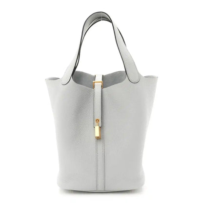 Picotin lock bucket tote, light blue pebbled leather, top handles and front clasp