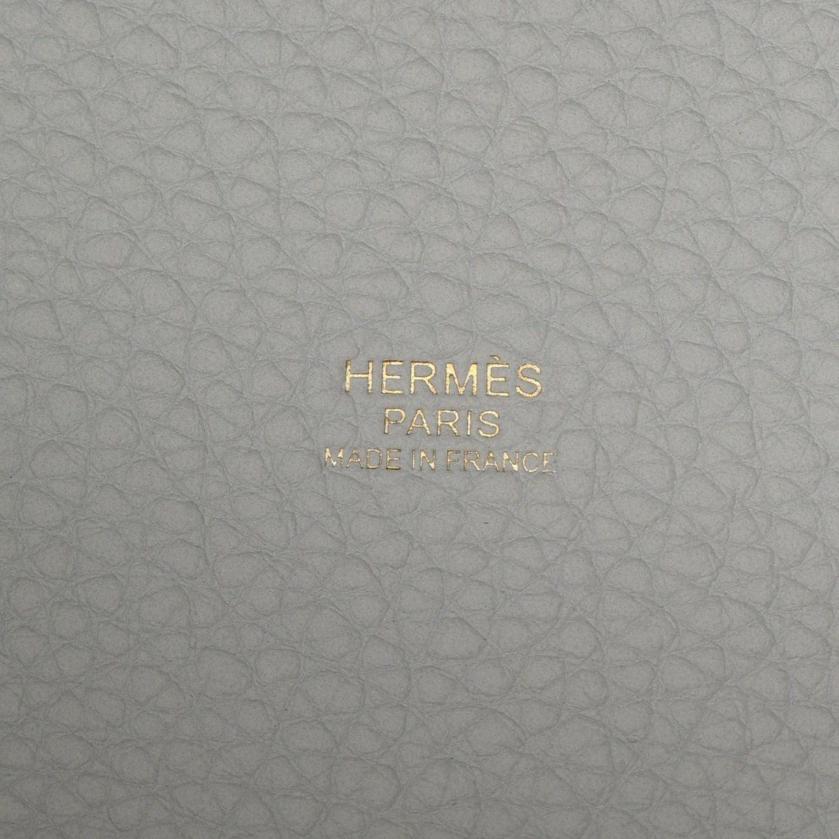 HERMES PARIS MADE IN FRANCE stamped on light blue pebbled leather