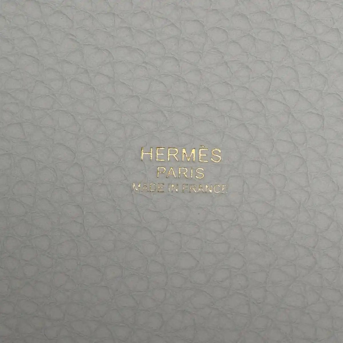 HERMES PARIS MADE IN FRANCE stamped on light blue pebbled leather