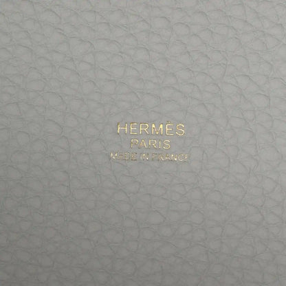 HERMES PARIS MADE IN FRANCE stamped on light blue pebbled leather