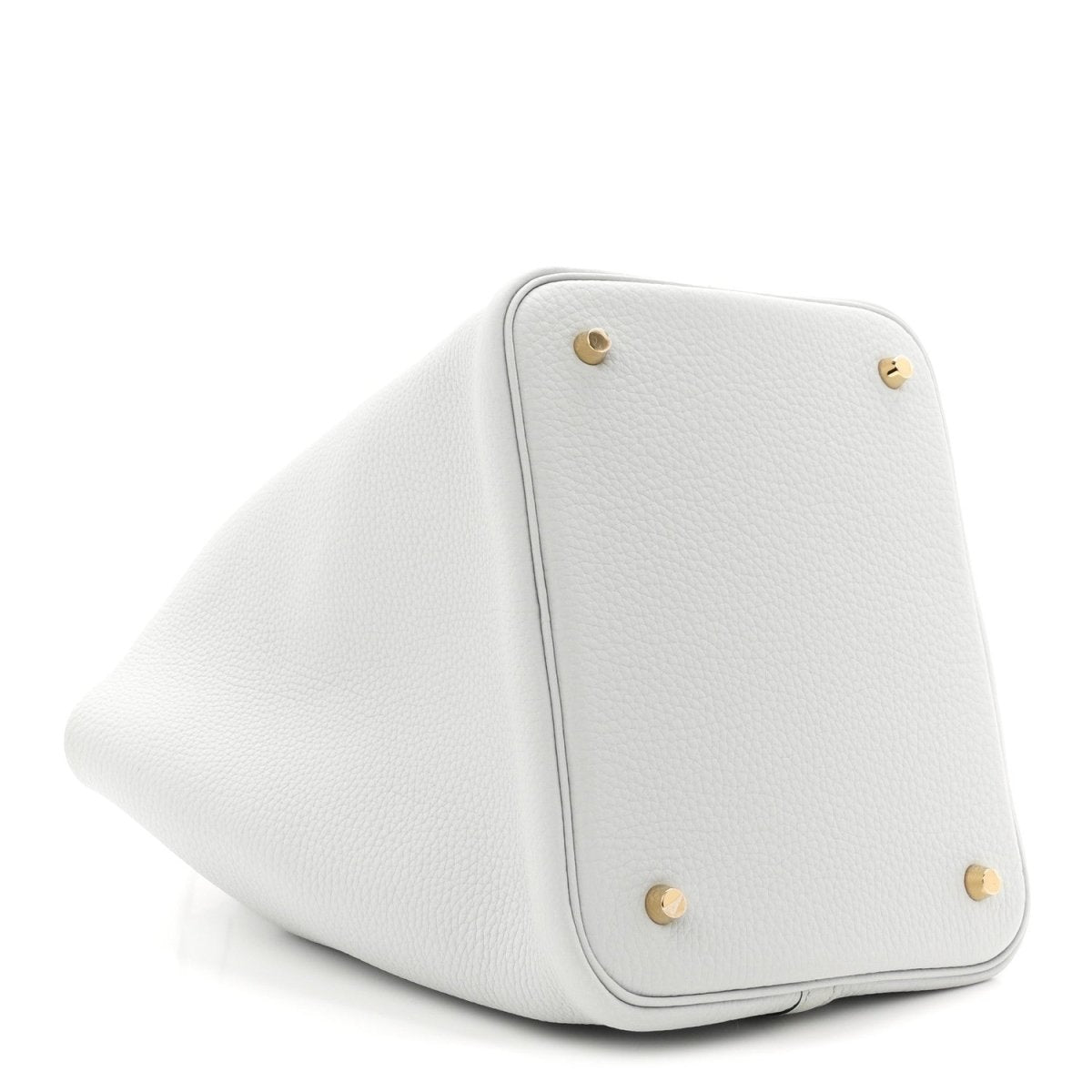 Light blue leather bucket tote corner with snap buttons and curved edge